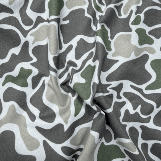 Youth Salt SQD fishing hoodie in Marsh Camo with four-way stretch fabric for beach outdoor wear.