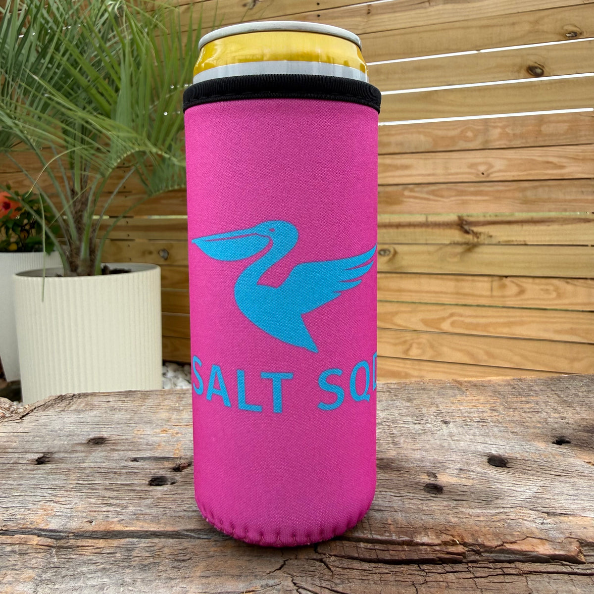Salt SQD slim coozie in Flamingo Vice, an insulated drink can sleeve with a soft, comfortable grip.
