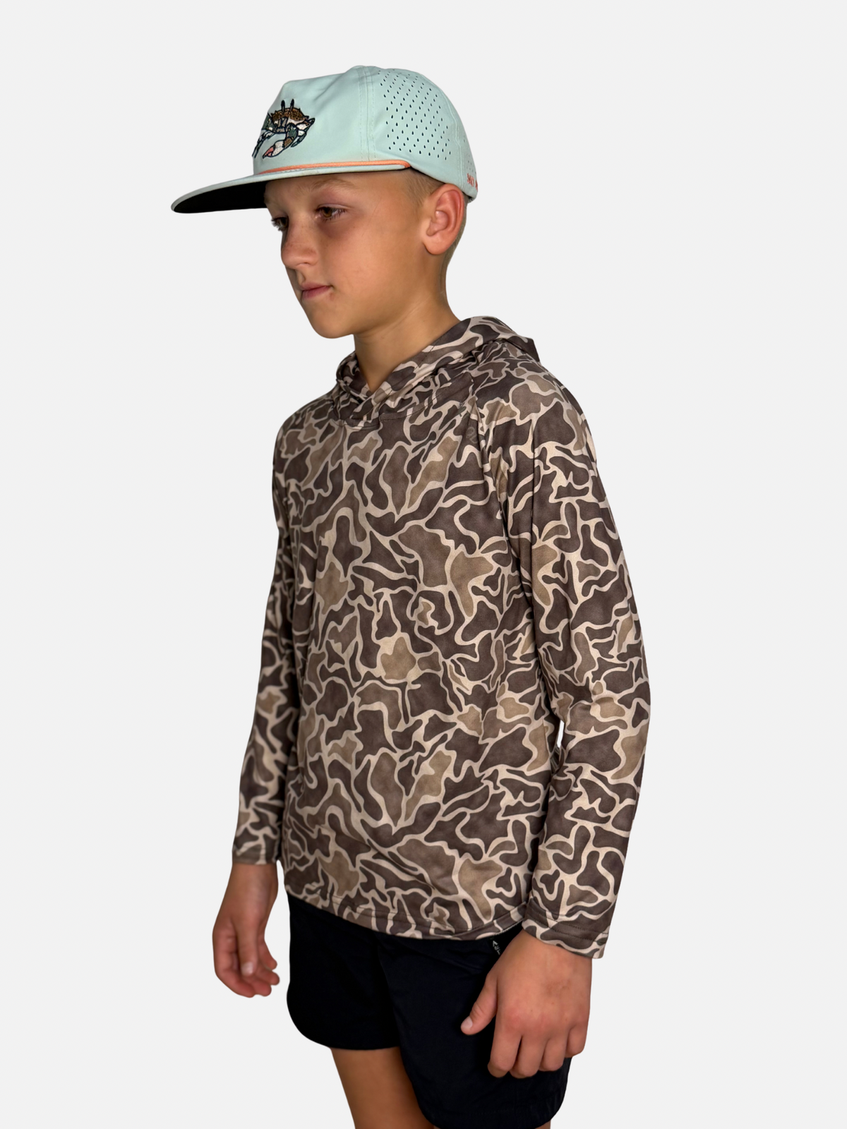 Youth Salt SQD SqdDrift fishing hoodie in Flounder Camo with four-way stretch fabric and UPF 35 sun protection