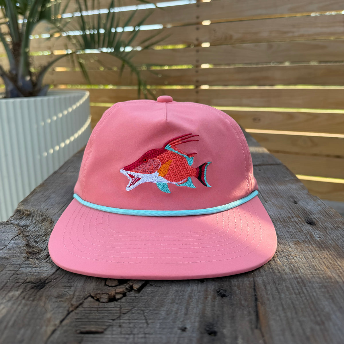 Coastal Icons cap by Salt SQD in Hogfish with water resistant five panel construction and embroidered fish detail.