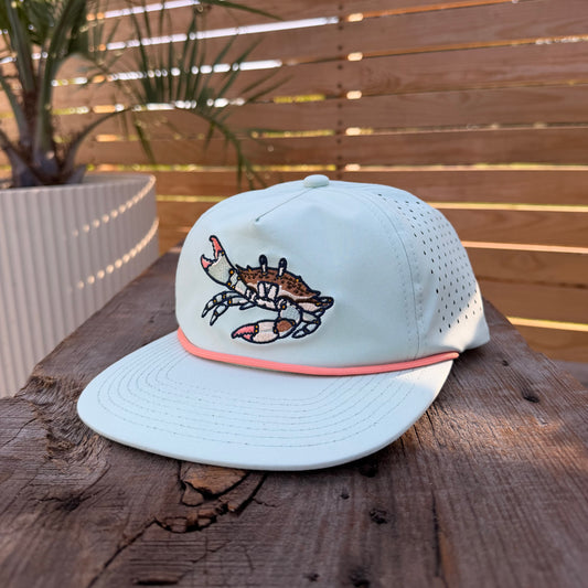 Salt SQD Coastal Icons cap in Blue Crab with a flat brim and detailed embroidered coastal icon designs.