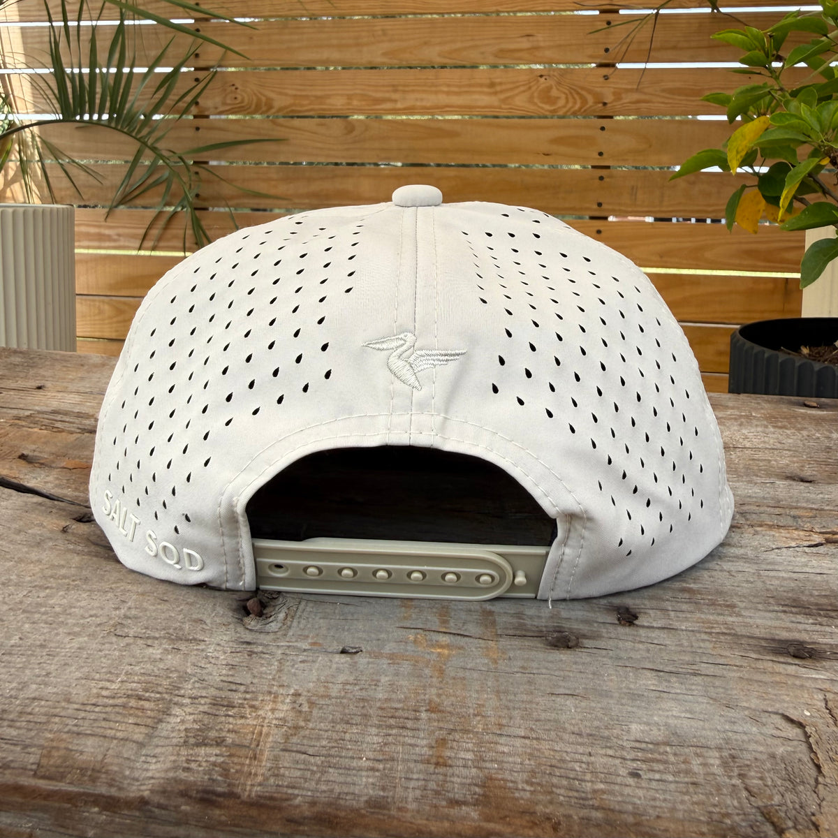 Coastal Reserve Salt SQD cap in Bonefish with an adjustable snapback closure and perforated fabric panels.