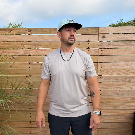 Salt SQD SqdDrift tee in Weathered Sand with four-way stretch fabric and UPF 35 sun protection.