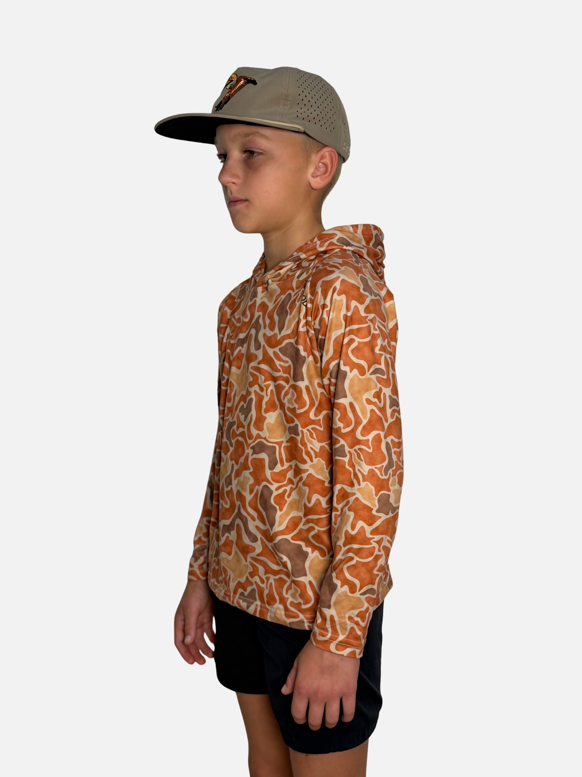 Youth Salt SQD SqdDrift fishing hoodie in Redfish Camo with four-way stretch fabric for easy movement.