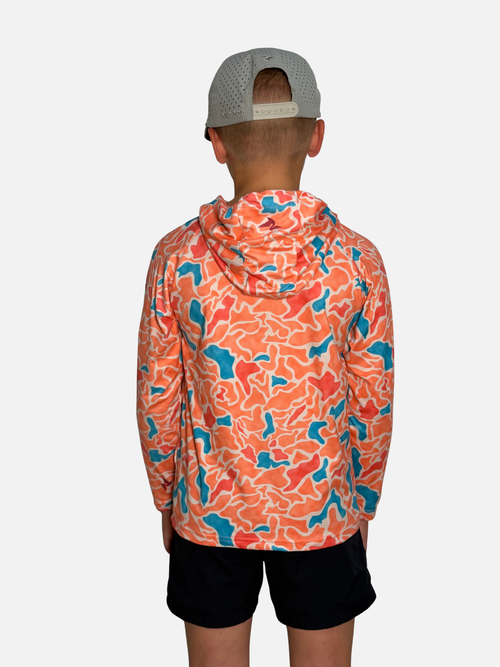 Youth Salt SQD SqdDrift fishing hoodie in Hogfish Camo with four-way stretch fabric for beach activities.