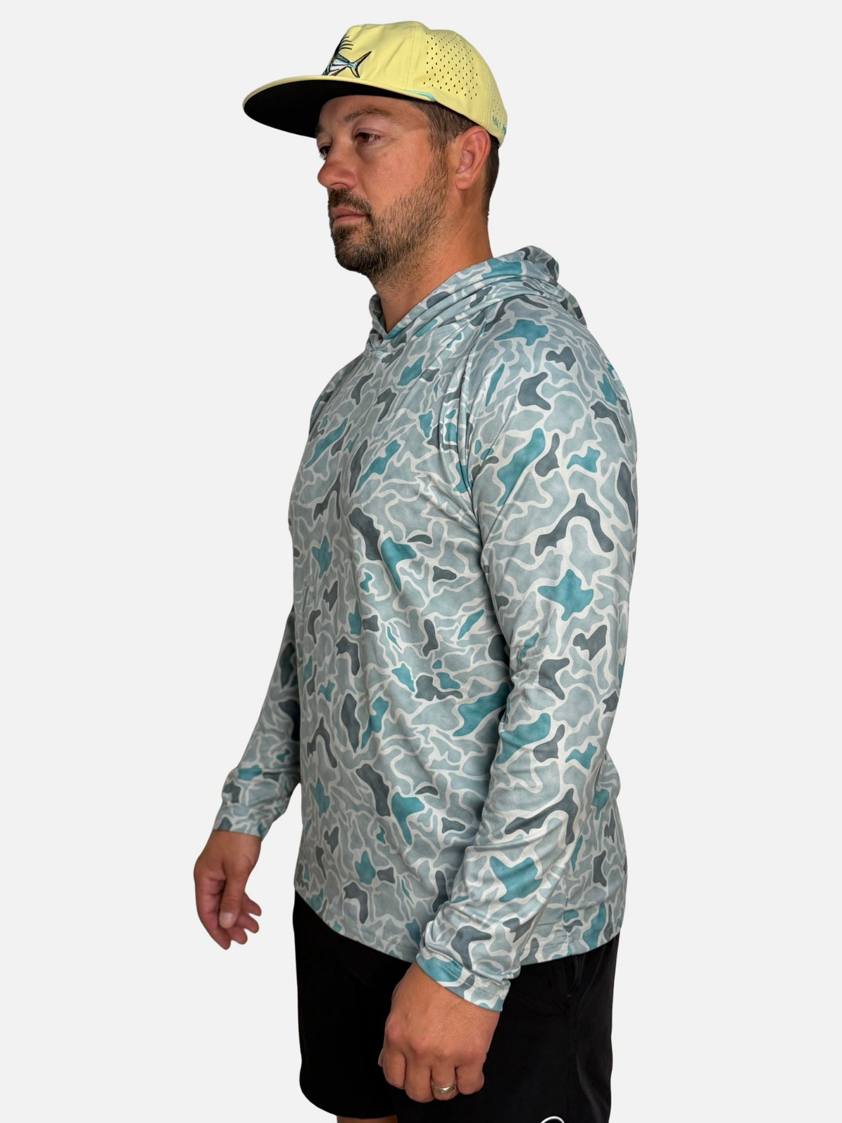 SqdDrift Salt SQD hoodie in Bonefish Camo with lightweight construction and a camouflage print shown in profile.