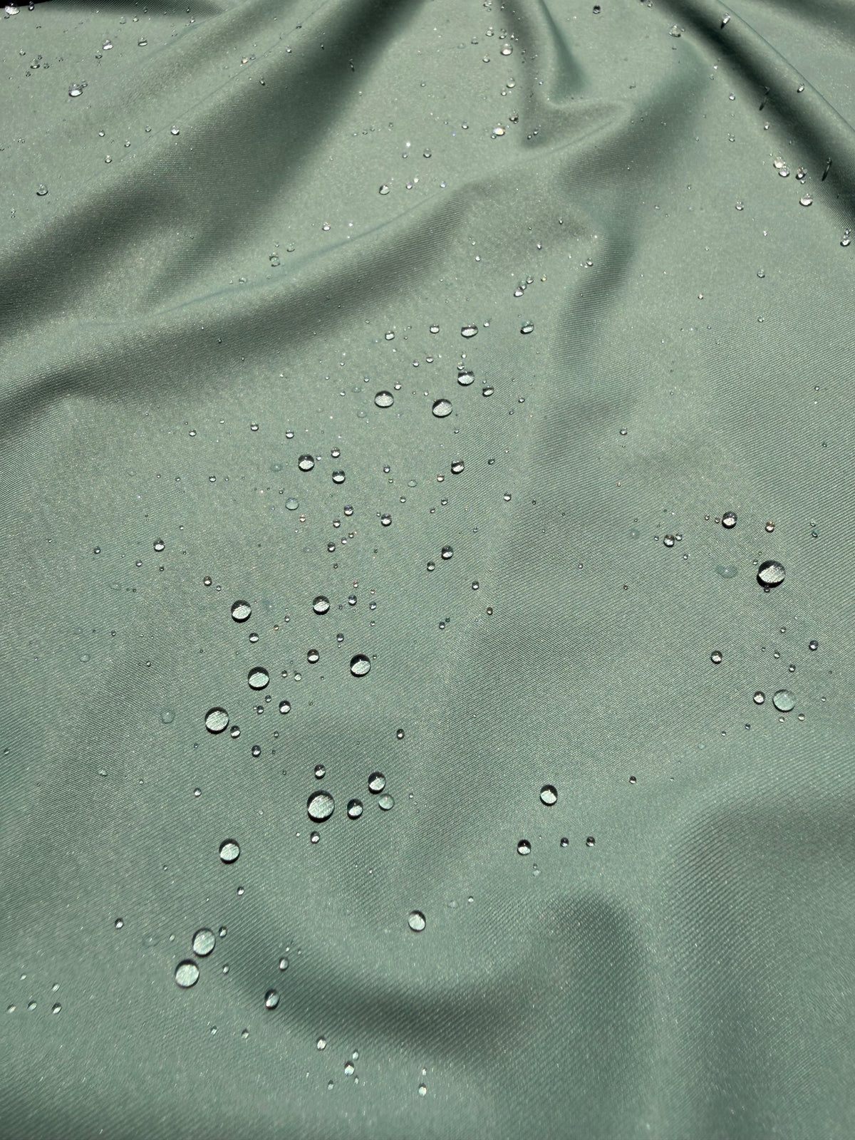 Coastal lifestyle performance tee with durable water repellent treatment