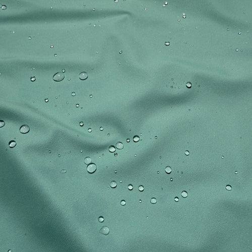 Coastal Core bundle by Salt SQD in Salt Sage with durable water repellent cap fabric beading visible droplets.